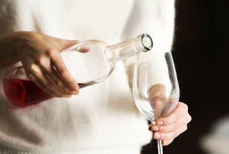 pouring craft wine into glass