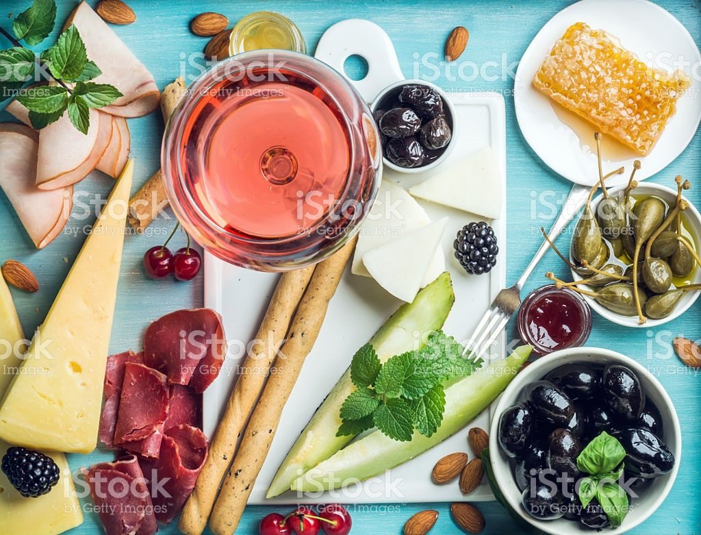 rosé wine and colourful antipasti