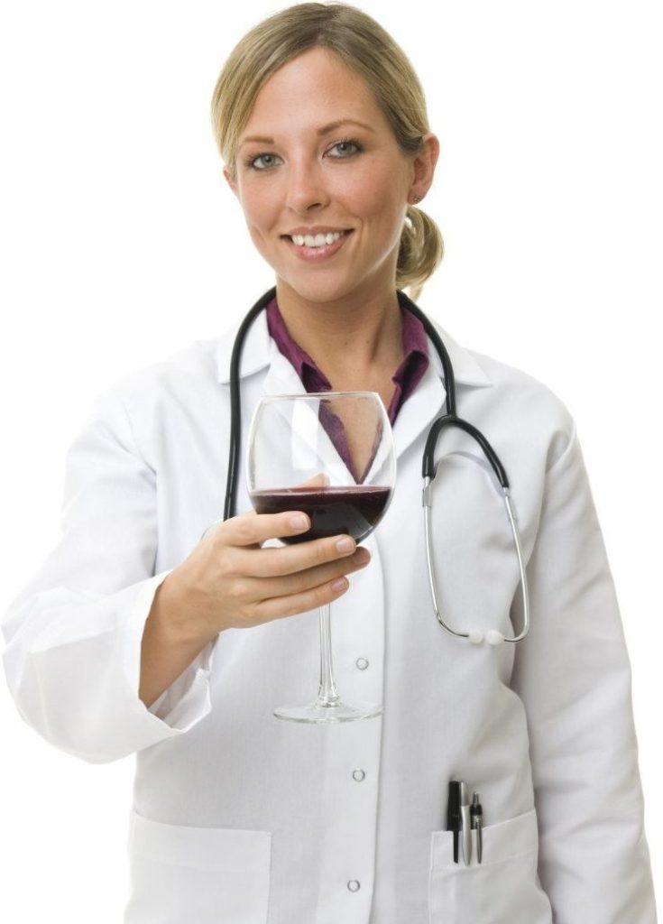 A doctor holding an a glass of wine. This image illustrates that one drink a day is good for health.