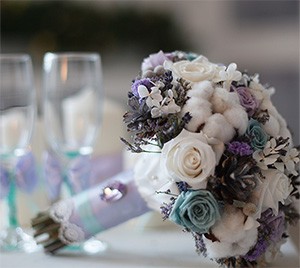 Bouquet and Wine Glasses